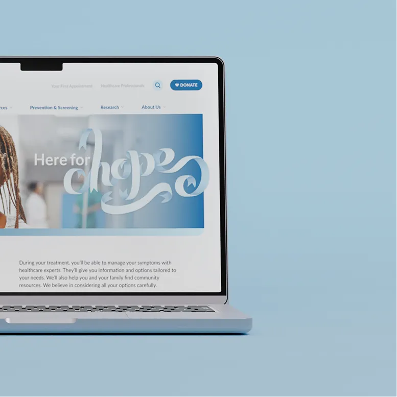 Close-up of the Sask Cancer Agency homepage on a laptop, featuring the 'Here for hope' hero banner